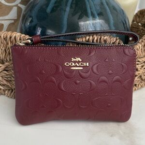 Coach Maroon Embossed Wristlet